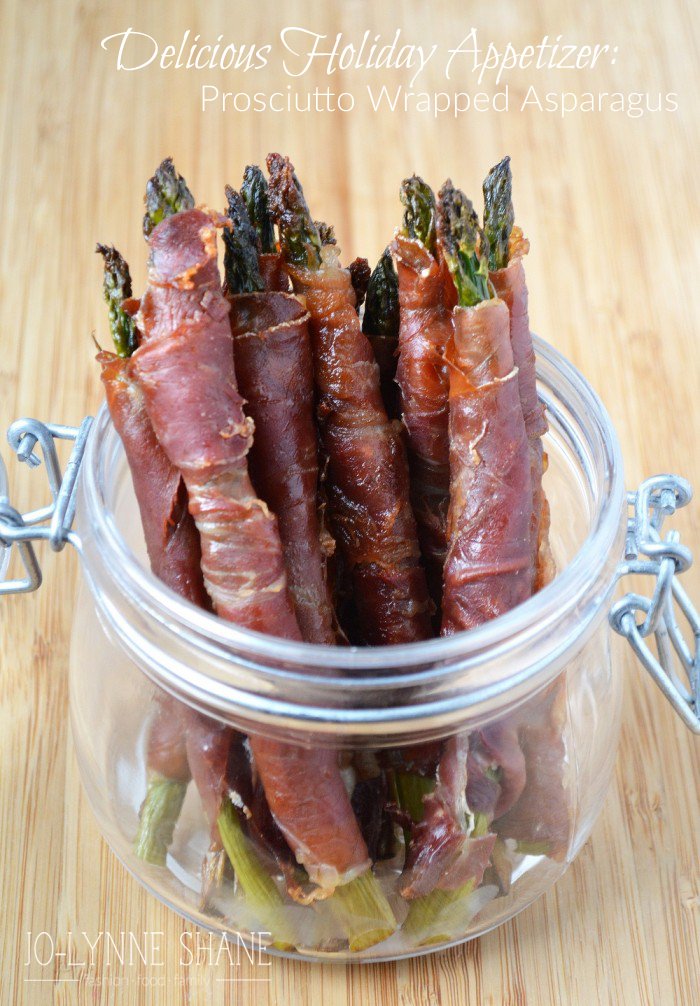 Bacon Wrapped Asparagus Appetizer: These delicious prosciutto wrapped spears will be a hit at any party and make an easy pick-up appetizer!