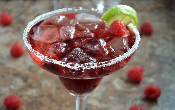 Celebrate National Margarita Day with this raspberry margarita recipe, made with Chambord. You will never go back to a classic margarita after you try this!