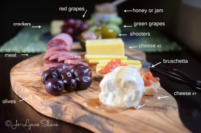 A beautiful Antipasto presented on an artisan olive cutting board makes a gorgeous rustic dish for casual entertaining! 
