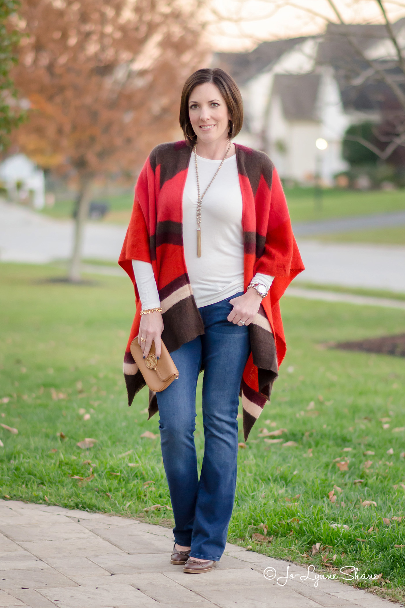 25 Days of Winter Outfit Ideas: Open Front Poncho with Bootcut Jeans and Wedge Pumps