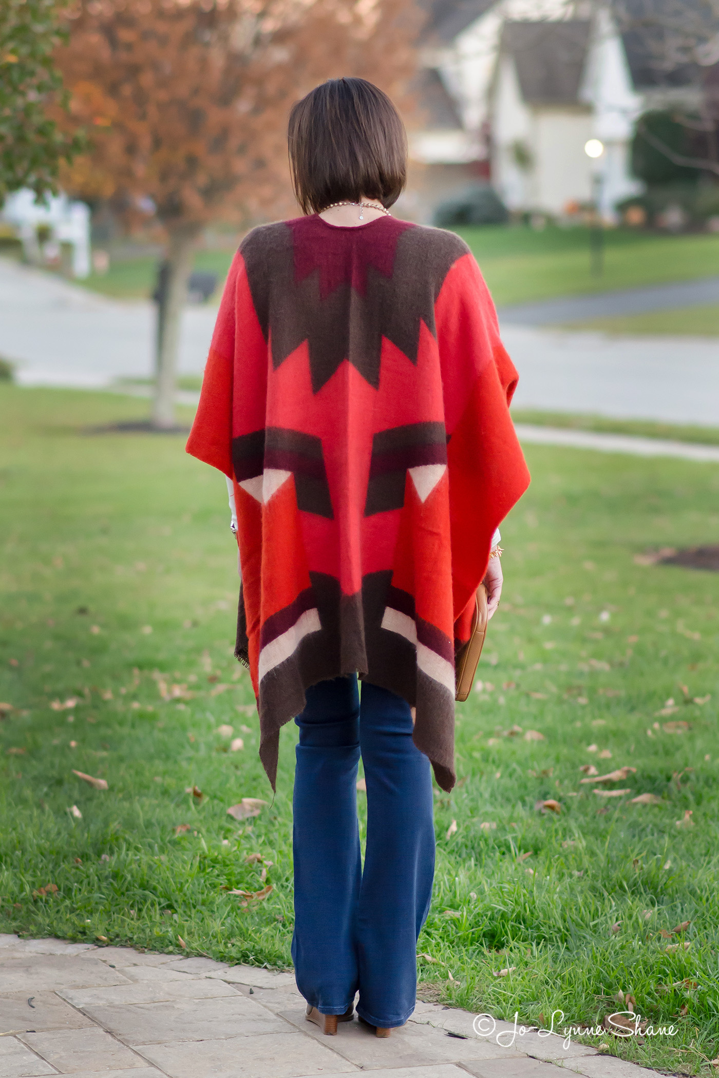 25 Days of Winter Outfit Ideas: Open Front Poncho with Bootcut Jeans and Wedge Pumps