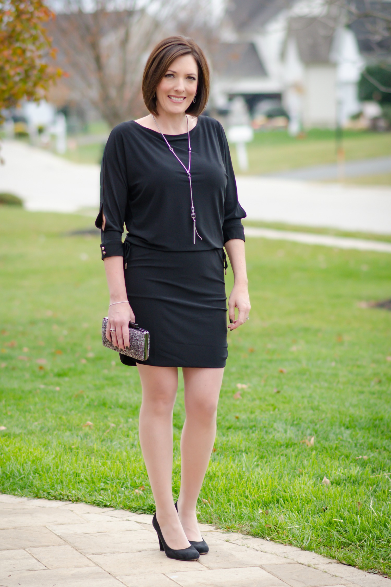What to Wear to an Office Christmas Party: LBD with fun accessories and black suede pumps