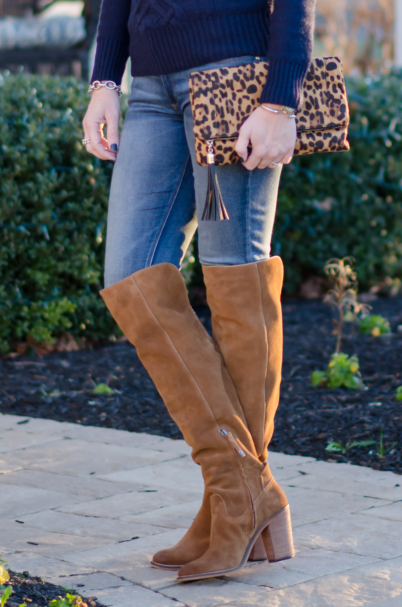 Wearable Winter Outfit Ideas For Women Over 40: Navy Turtleneck with Chestnut OTK Boots