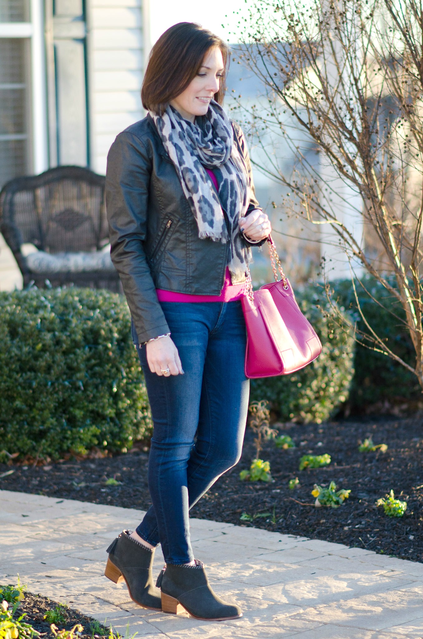 Easy and Chic Outfit Formula for Women Over 40: bright cashmere sweater with skinny jeans, ankle boots and a moto jacket. Throw on a scarf and carry a great bag!