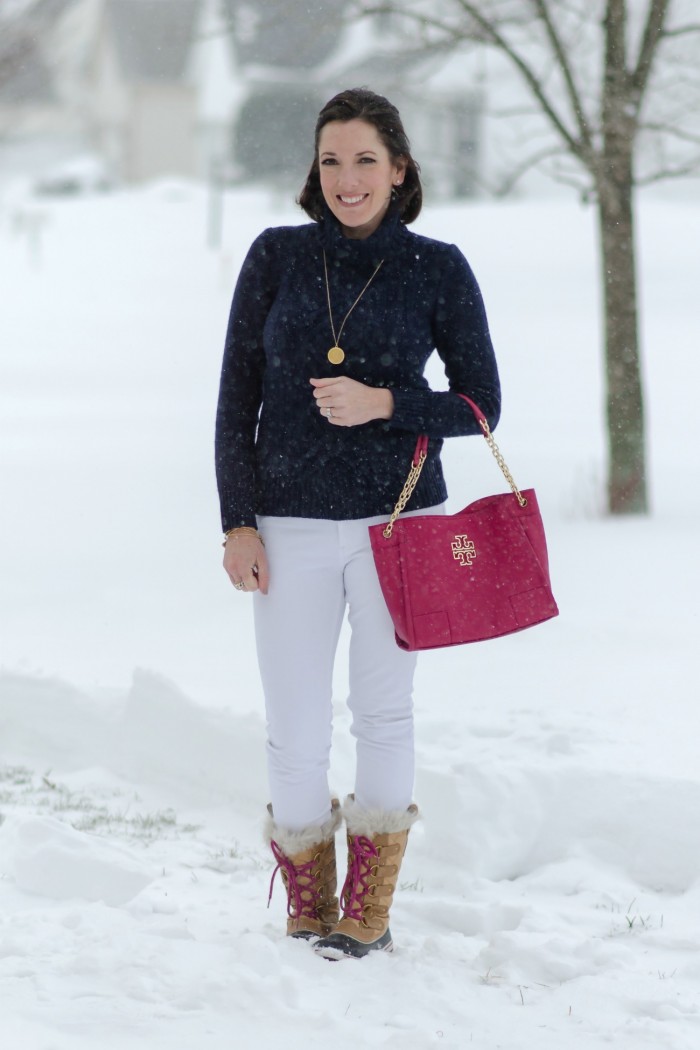 Fashion Over 40 | Snow Day Winter Outfit Ideas: Navy J.Crew Cambridge Cable Turtleneck with DL1961 Florence Skinny Jeans in Milk and Sorel Tofino Cate snowboots c/o Zappos. Add a bright pink Tory Burch tote for a fun punch of color!