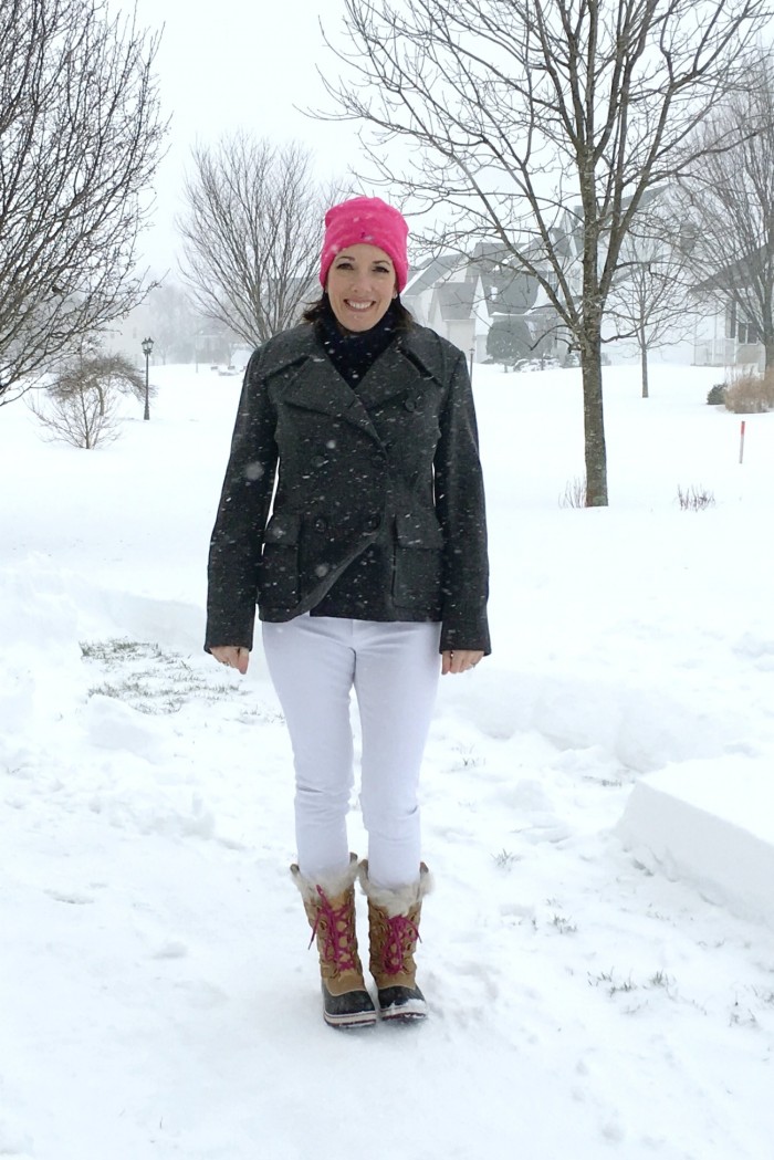 Fashion Over 40 | Snow Day Winter Outfit Ideas: Navy J.Crew Cambridge Cable Turtleneck with DL1961 Florence Skinny Jeans in Milk and Sorel Tofino Cate snowboots c/o Zappos. Add a bright pink Tory Burch tote for a fun punch of color!