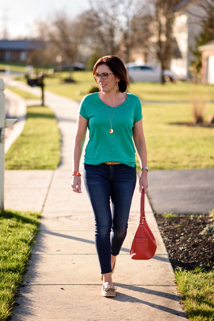 Spring Outfit Inspo: Kelly Green with Dark Denim and boat shoes with pops of coral