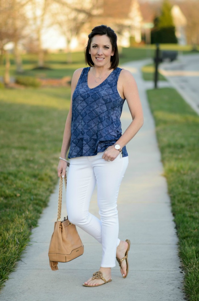 Spring fashion with this relaxed split hem printed top from Old Navy, white jeans, and nude sandals!