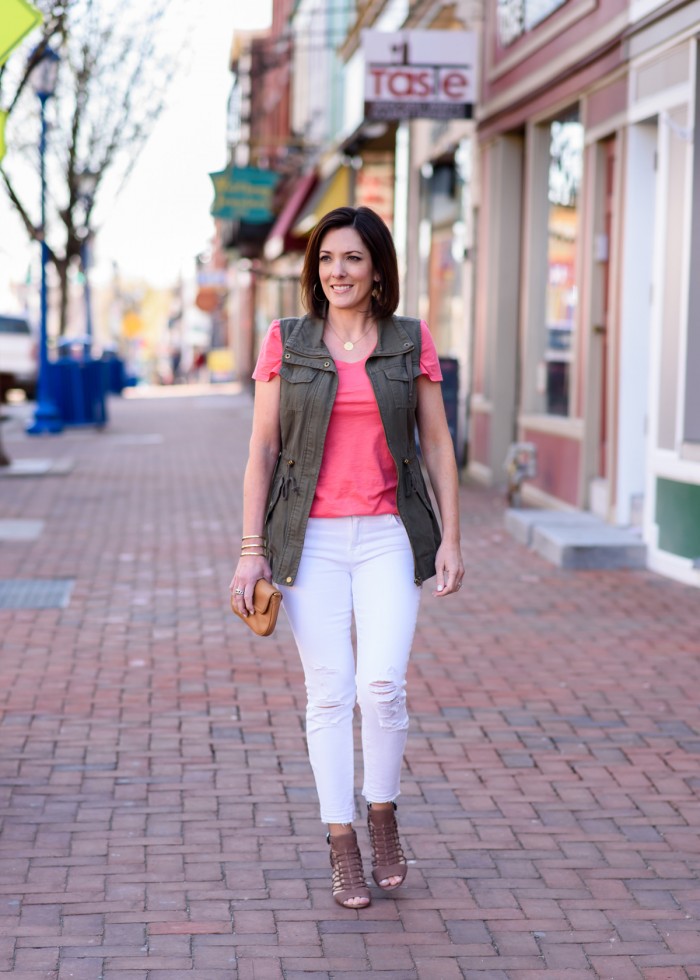 How to Wear a Utility Vest for Spring featuring LOFT Vintage Soft Tee in Pink Zinnia, J.Brand Low Rise Crop Jeans in Demented White Distressed, and Vince Camuto Evel Leather Sandals | Wearable Spring Fashion for Moms