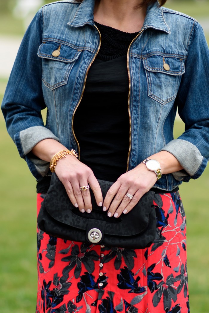 Boho Chic: Red Floral Maxi Skirt with Black Tee and Denim Jacket Closeup