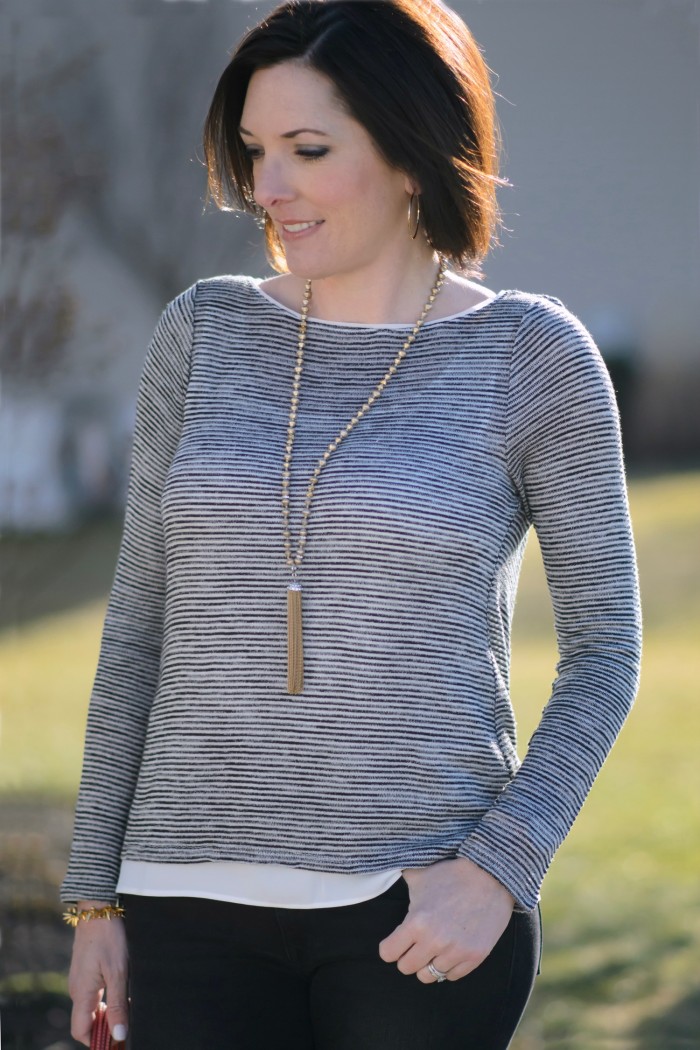Spring Date Night Outfit: Striped Cross-Back Tee with Tassel Necklace and Black Jeans | Fashion Over 40