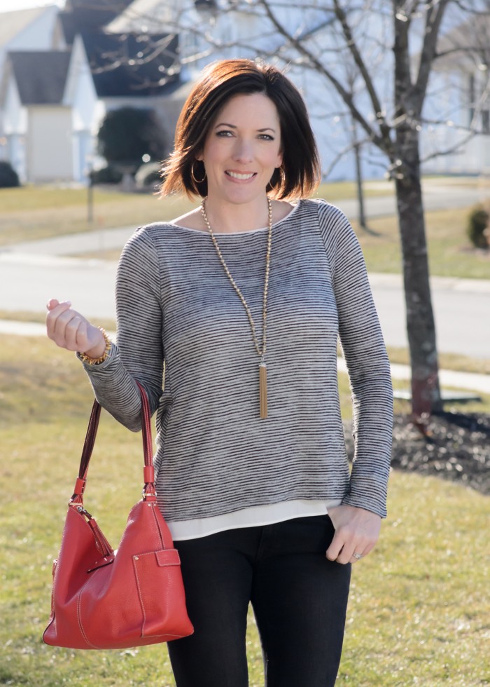 Spring Date Night Outfit: Striped Cross-Back Tee with Black Jeans and Coral Handbag | Fashion Over 40