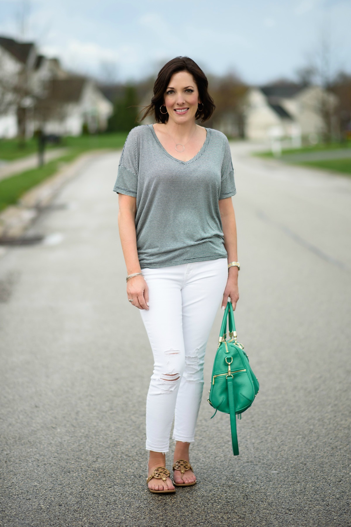 Casual Spring Outfit with White Distressed Jeans and Navy and White striped dolman sleeve top