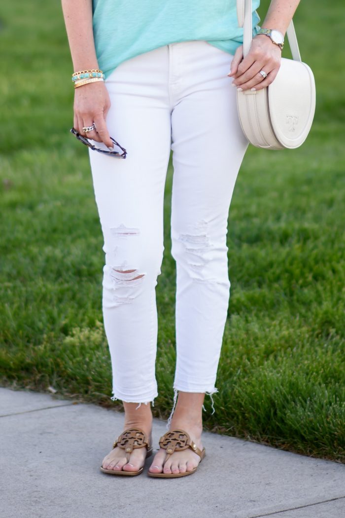 Jo-Lynne Shane in J Brand Low Rise Crop Jeans (Demented White Distressed) with Tory Burch Miller Flip-Flops