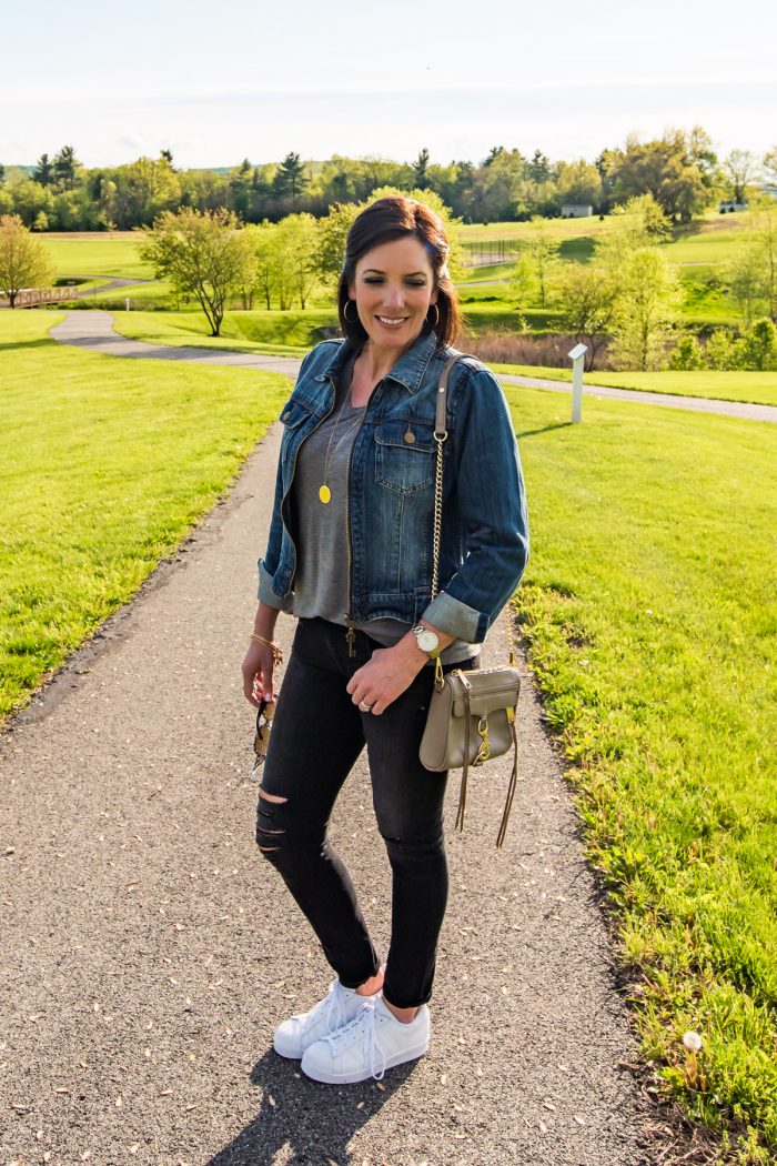 Jo-Lynne Shane rocking the athleisure trend with Adidas Superstars, distressed black jeans, grey tee and a denim jacket.