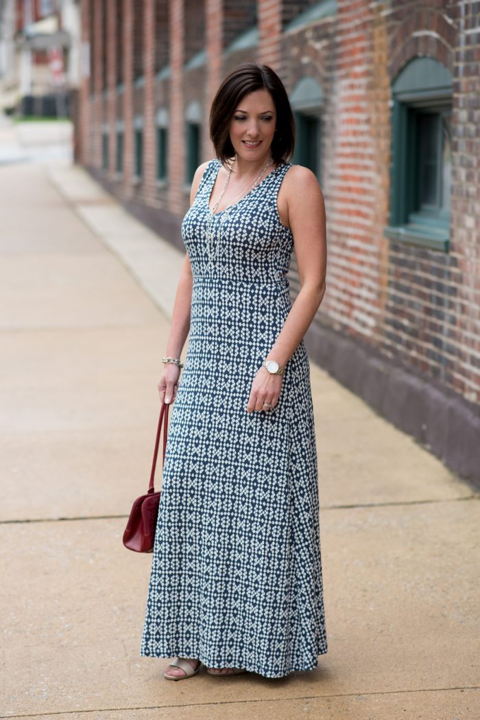 Jo-Lynne Shane in a blue and white V-Neck Maxi Dress with a red bag