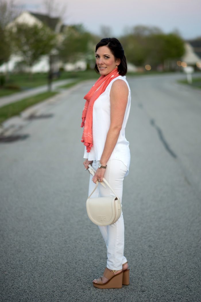 Jo-Lynne Shane showing how to style a spring scarf featuring LOFT coral whale scarf with white shirred blouse and white DL1961 Florence skinnies.