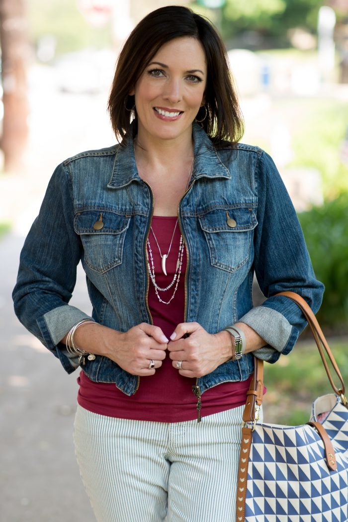 jean jacket with red tank and striped pants top