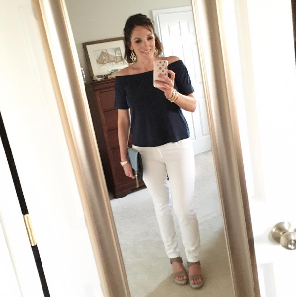 navy off the shoulder top with white jeans and wedge sandals
