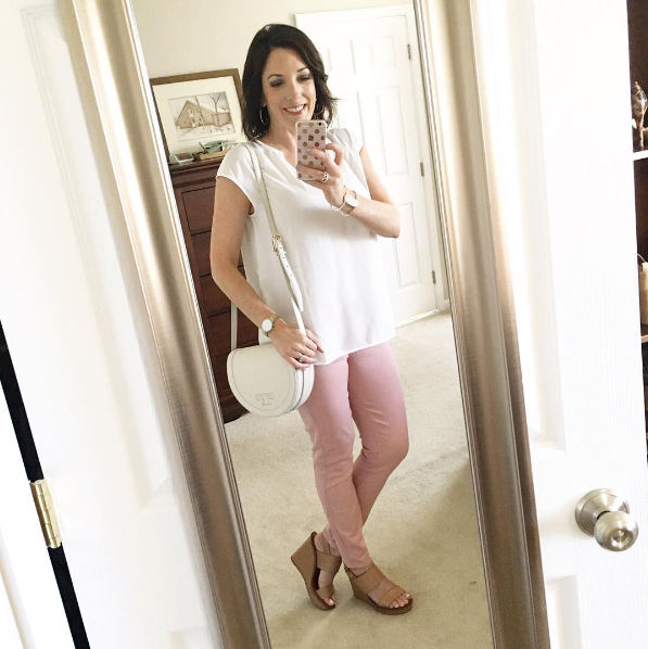 pink jeans and ivory pleat back blouse