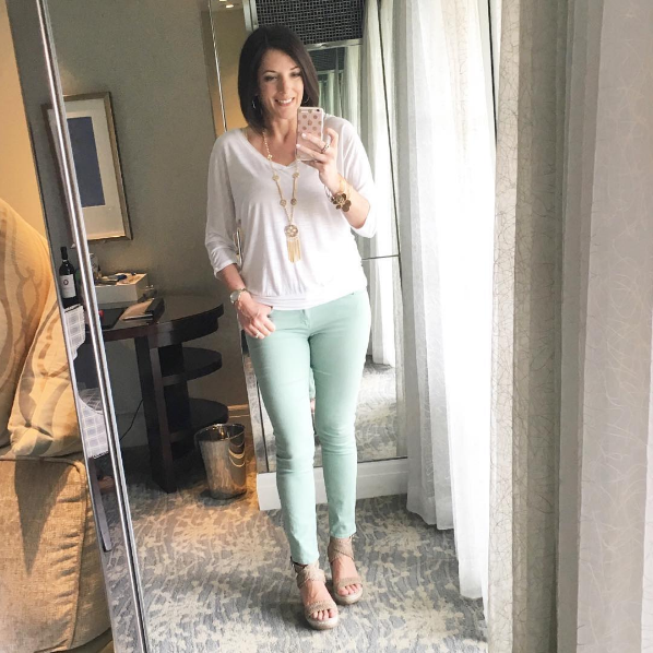 white top with mint jeans