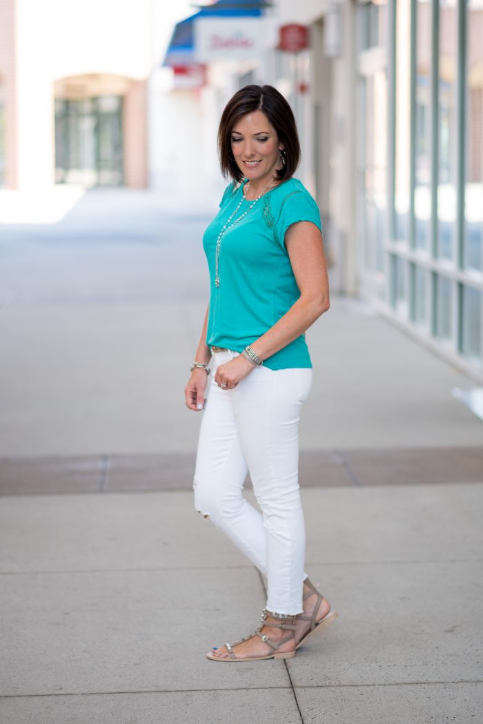teal tee with gladiator sandals and white crop jeans 3