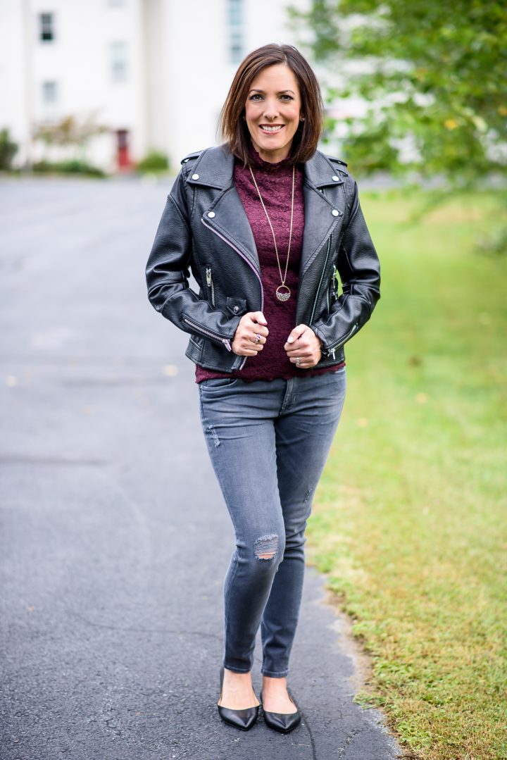 Love the tough and feminine mix of leather and lace! This fall outfit combines a leather moto jacket with lace mock neck top and distressed grey skinnies.