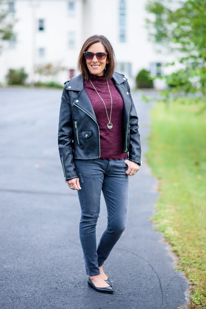 Love the tough and feminine mix of leather and lace! This fall outfit combines a leather moto jacket with lace mock neck top and distressed grey skinnies.