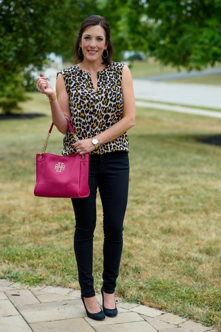 Leopard silk top with black jeans and pumps and a pop of pink!