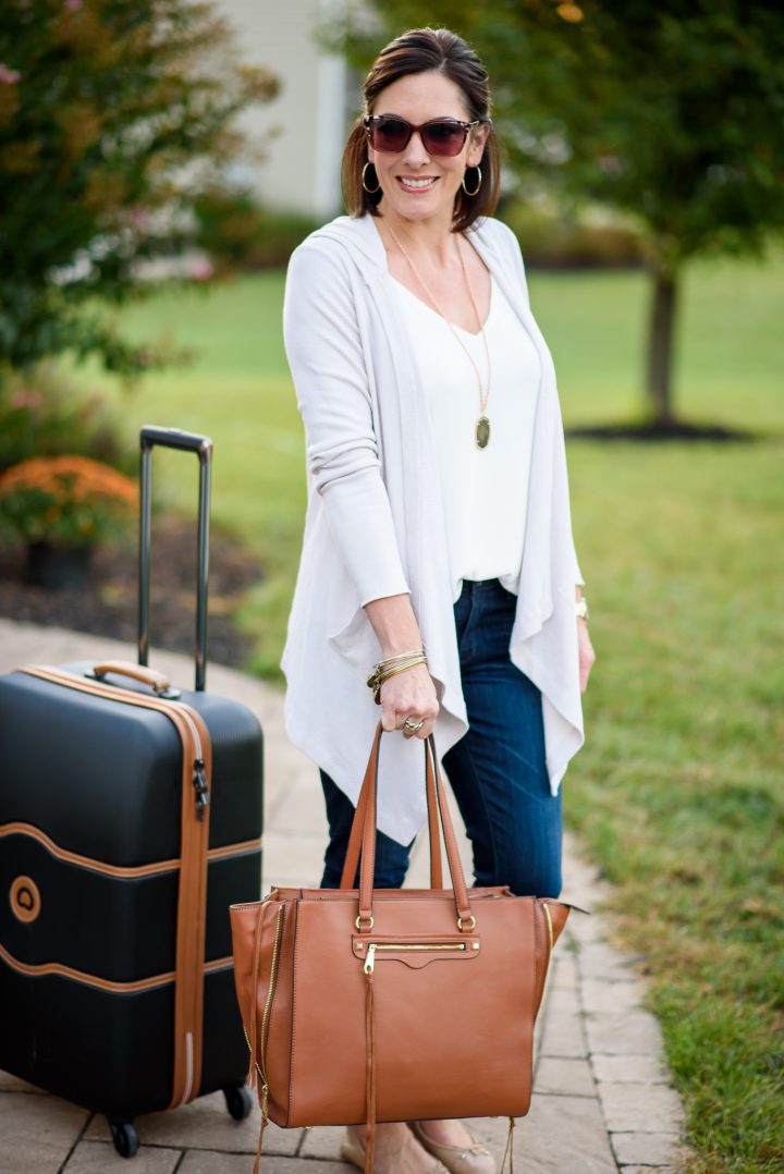 This casual fall travel outfit combines several neutrals that are all pieces I can mix and match with other items in my suitcase while I'm away.