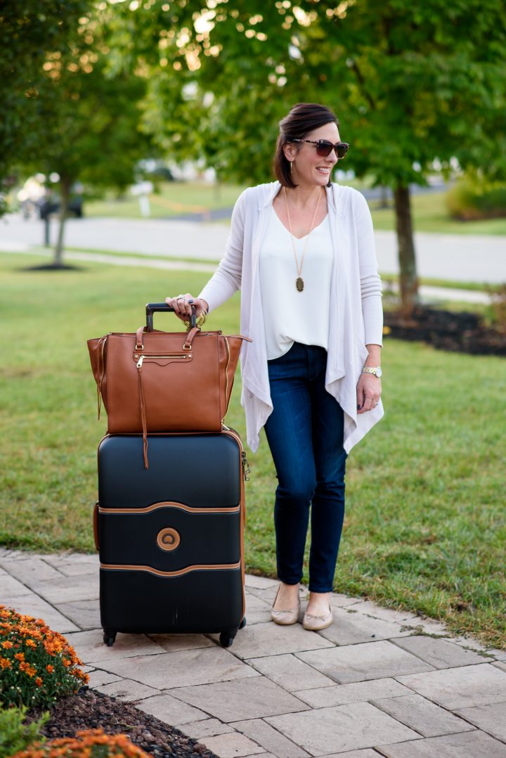 This casual fall travel outfit combines several neutrals that are all pieces I can mix and match with other items in my suitcase while I'm away.