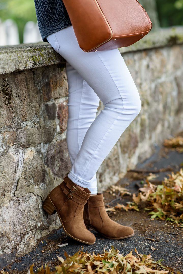 a white jeans outfit for fall featuring Rooda Ankle Strap Booties from Payless