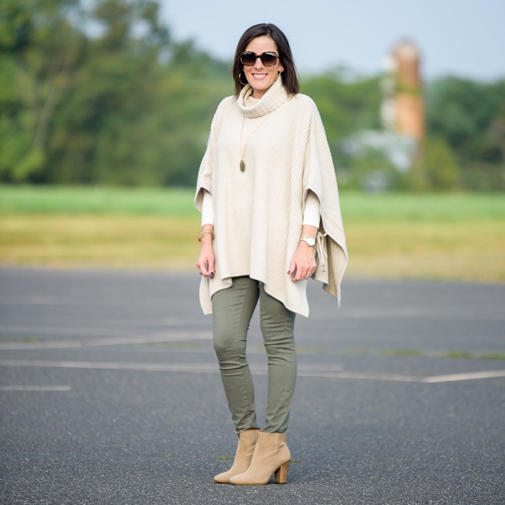 beige-poncho-with-green-jeggings