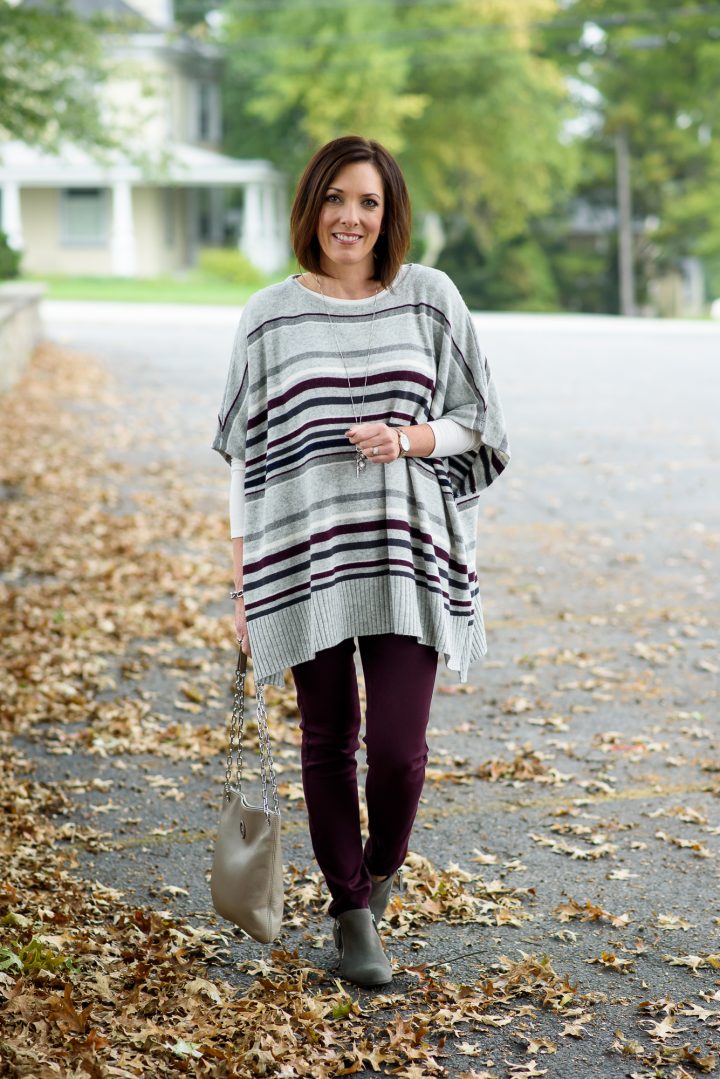 I'm styling this cozy striped poncho over a long-sleeve tee with plum skinnies and grey VANELi booties -- the low shaft helps elongate the leg!