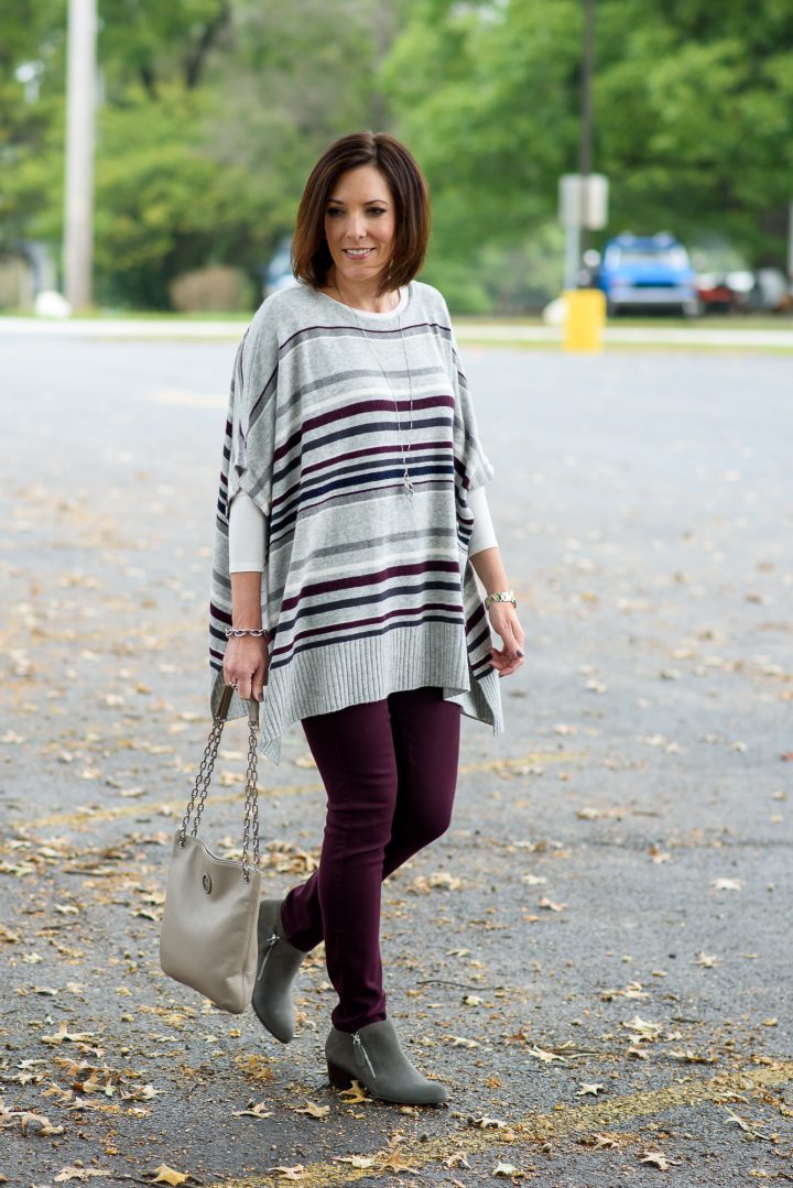 I'm styling this cozy striped poncho over a long-sleeve tee with plum skinnies and grey VANELi booties -- the low shaft helps elongate the leg!