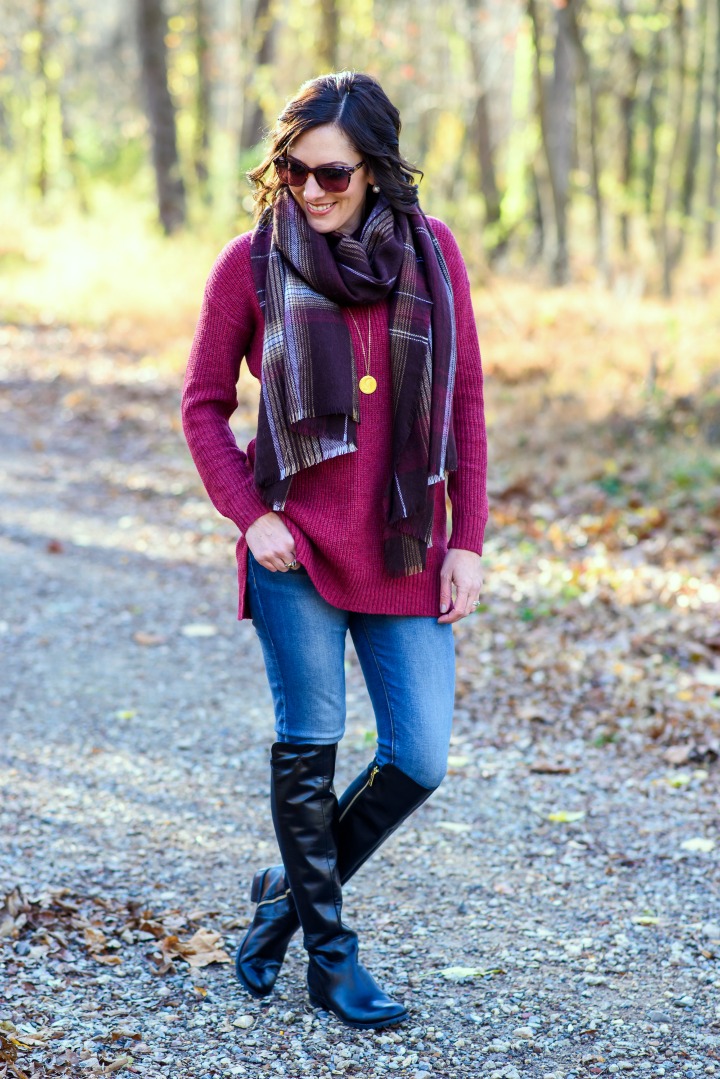 Casual Winter Outfit Inspo: Red Ribbed Mock Neck Pullover with Plaid Scarf, Skinny Jeans, and black leather OTK flat boots