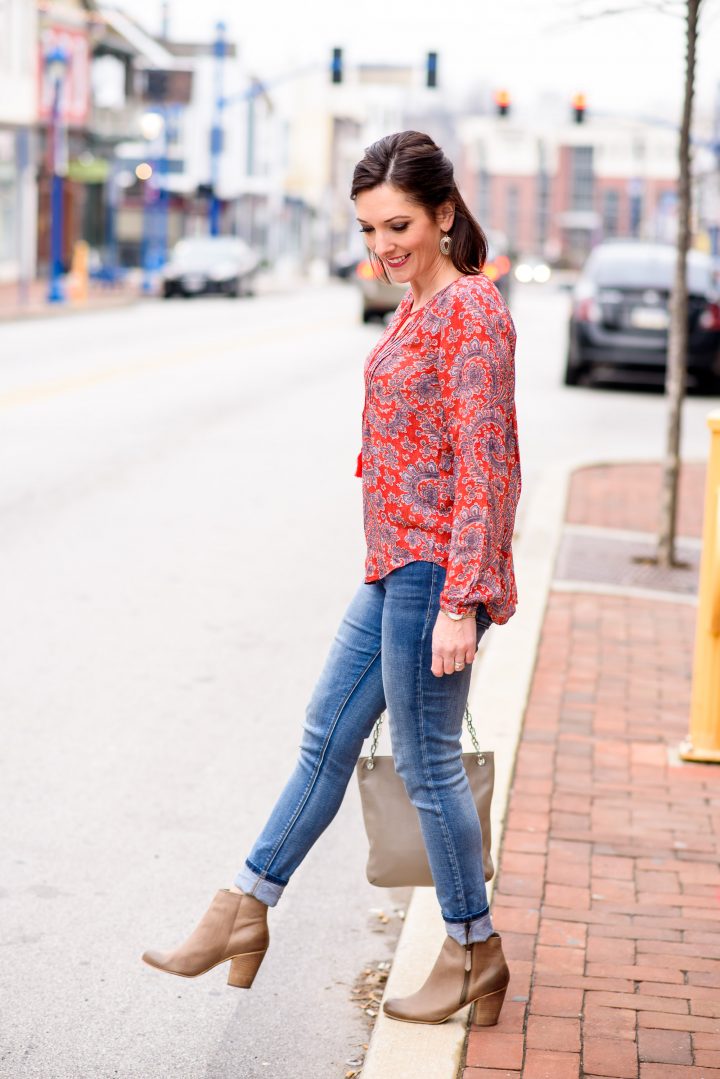 Printed Peasant Top with Blue Jeans and Grey Booties