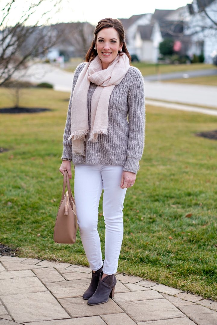 Bundled Up in Pastels: marled silver sweater and a blush scarf with white jeans and grey suede booties