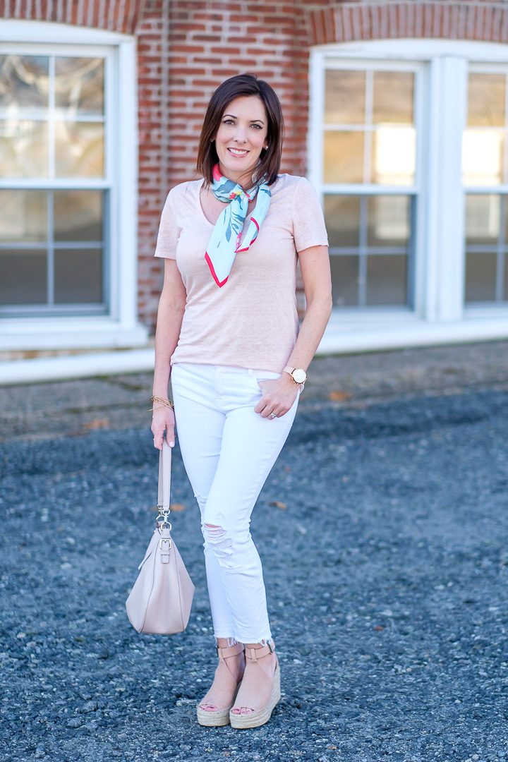Styling a simple spring outfit showing how to wear a neck scarf, a popular fashion trend for spring 2017! The distressed jeans keep it from being too sweet.