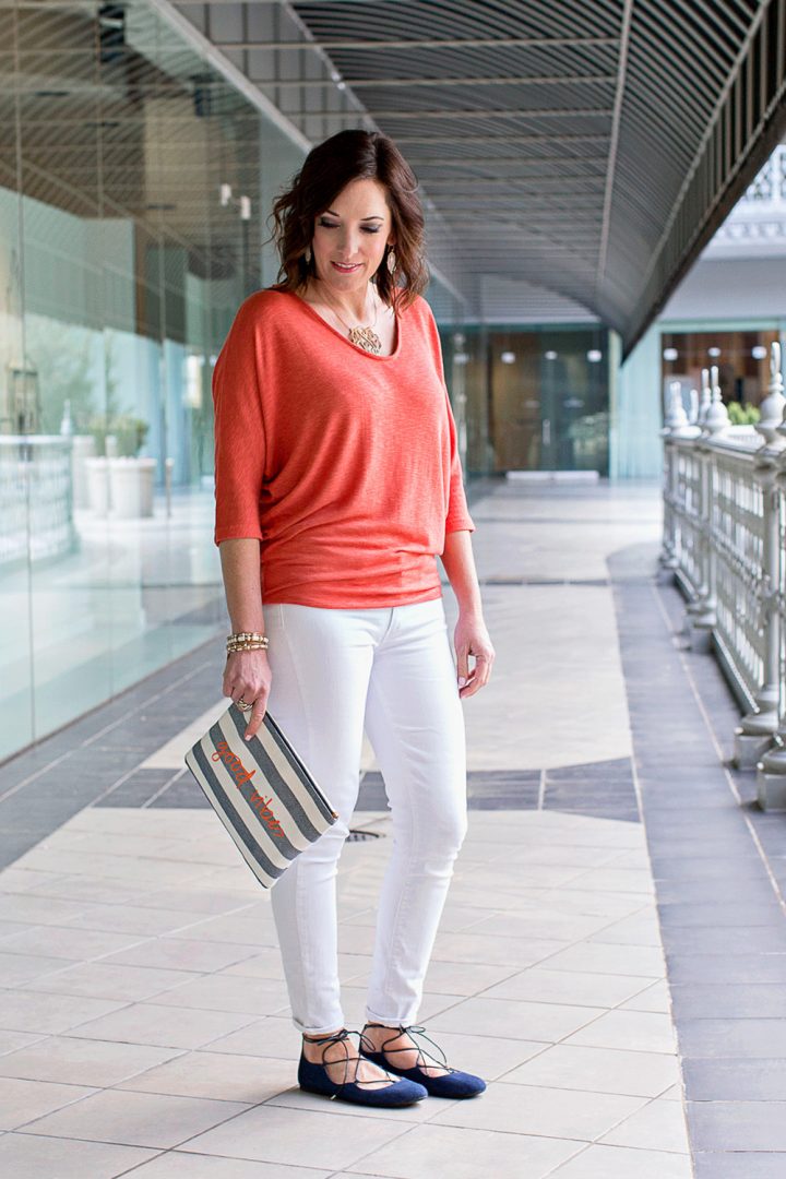 Spring Outfit: Orange Dolman via Stitch Fix, Stella & Dot All In One Good Vibes Pouch, white Paige Verdugo Ankle skinnies, Sam Edelman Flynt Ghillie Flats