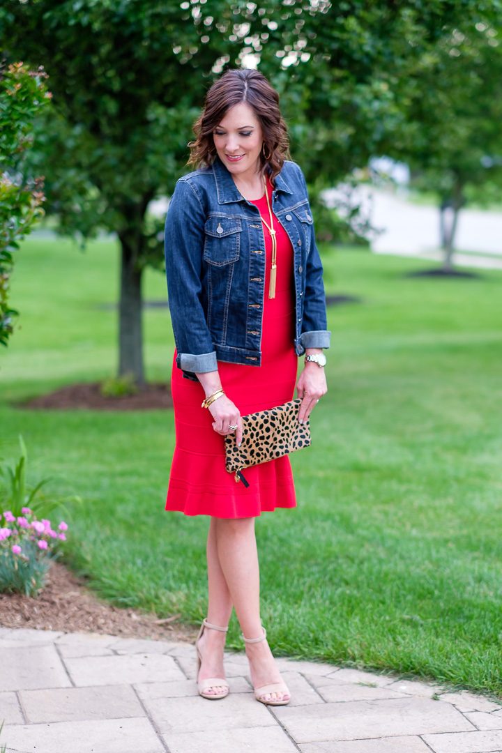 Today I'm teaming up with Nordstrom to style a fun and flirty look featuring a red sleeveless summer sweater dress with a denim jacket, neutral block heel sandals, and leopard clutch.