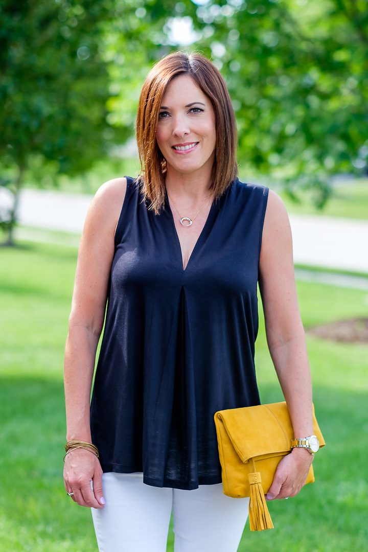 Black and White Summer Outfit with Yellow Tassel Clutch