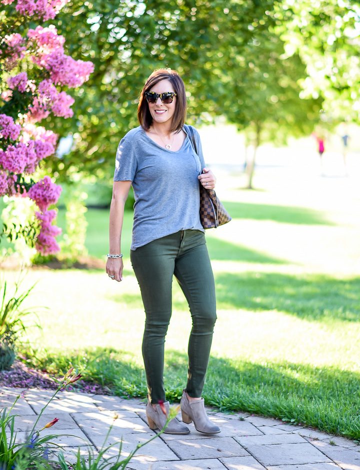 How to Wear Spruce Green Jeans: I paired the spruce green jeans with a grey t-shirt and taupe ankle boots, and I carried my Neverfull. I like the combination of the browns in my tote with the neutral green and grey tones in the rest of the outfit. It keeps the look casual and doesn't look like I'm trying too hard to mach.