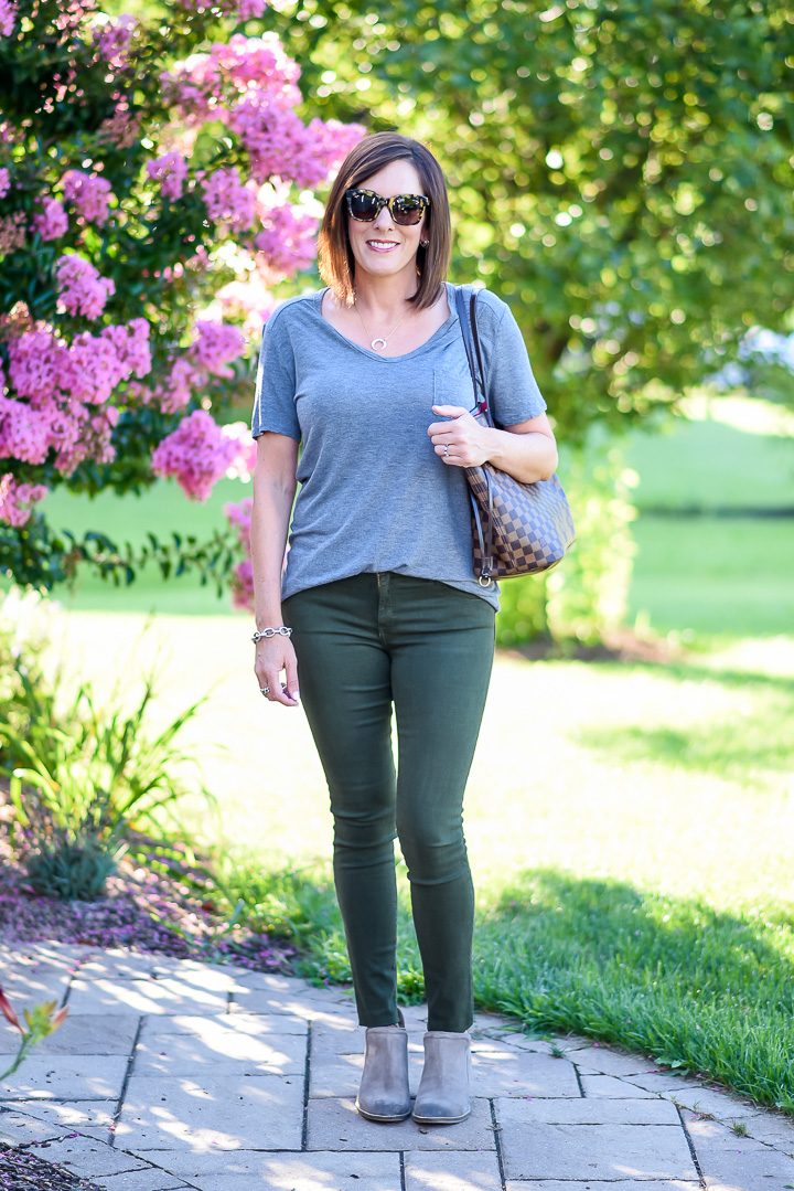 How to Wear Spruce Green Jeans: I paired the spruce green jeans with a grey t-shirt and taupe ankle boots, and I carried my Neverfull. I like the combination of the browns in my tote with the neutral green and grey tones in the rest of the outfit. It keeps the look casual and doesn't look like I'm trying too hard to mach.
