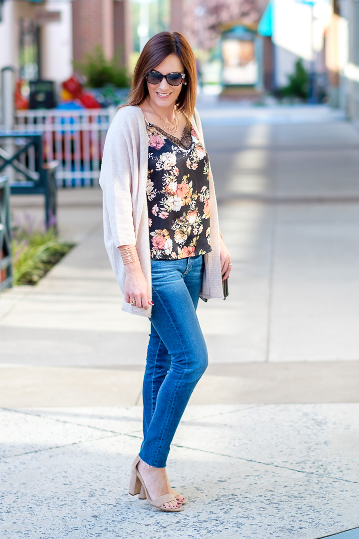 Fall Outfit Inspo: Jo-Lynne Shane wearing floral cami, with a cashmere cocoon cardigan, AG legging ankle jeans, and suede ankle strap sandals.