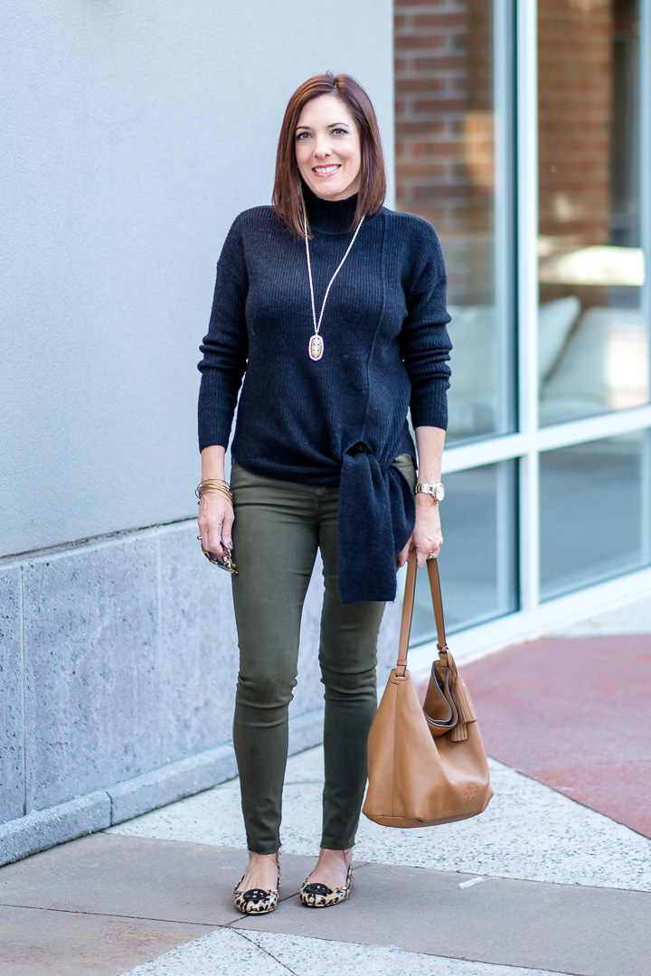 Fall Fashion for Women Over 40: This simple outfit is a combination of some of my favorite fall basics -- colored denim, leopard flats, a black sweater, and a neutral handbag.