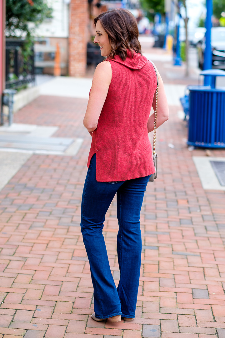 Fall Fashion for Women Over 40: Sleeveless Cowl Neck Sweater + Bootcut Jeans with Block Heel Sandals 