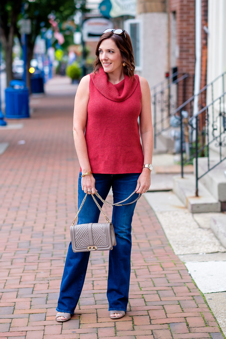 Fall Fashion for Women Over 40: Sleeveless Cowl Neck Sweater + Bootcut Jeans with Block Heel Sandals 